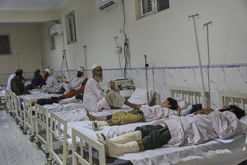 Afghans injured in a powerful earthquake that struck eastern Afghanistan on Sunday, lie on beds at Nangarhar Regional Hospital in Jalalabad, Afghanistan, Wednesday, Sept. 3, 2025. (AP Photo/Siddiqullah Alizai)