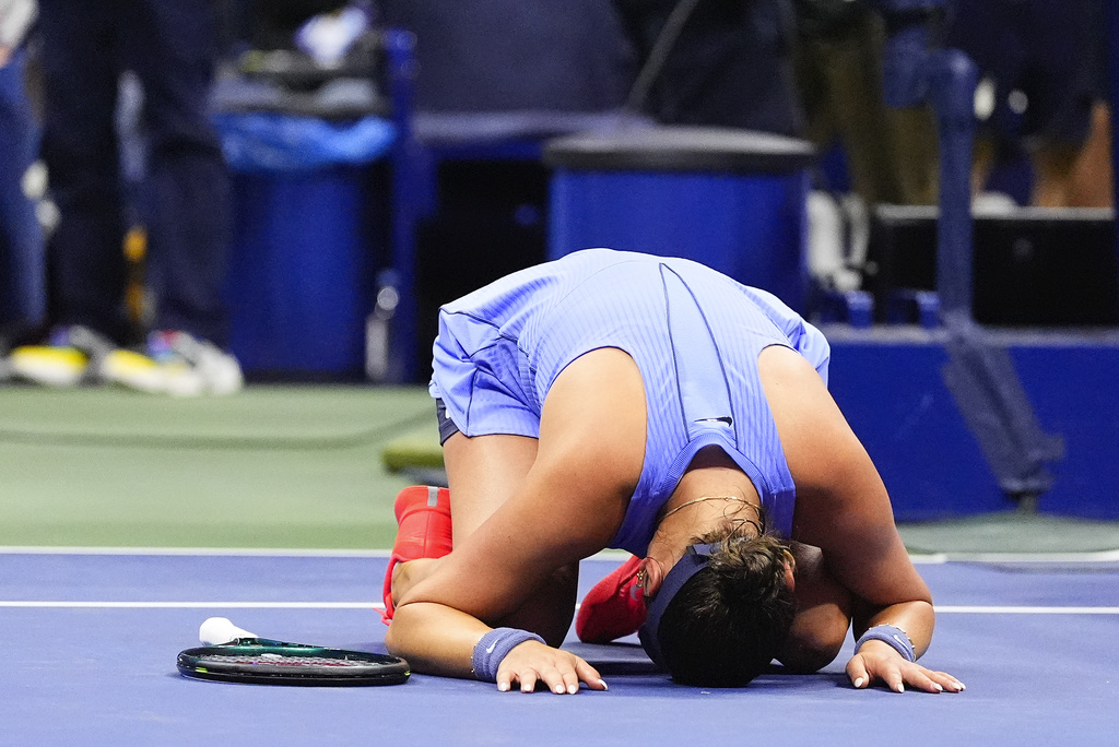Amanda Anisimova, of the United States, reacts after defeating Naomi Osaka, of Japan, during the women's singles semifinals of the U.S. Open tennis championships, Friday, Sept. 5, 2025, in New York. (AP Photo/Yuki Iwamura)