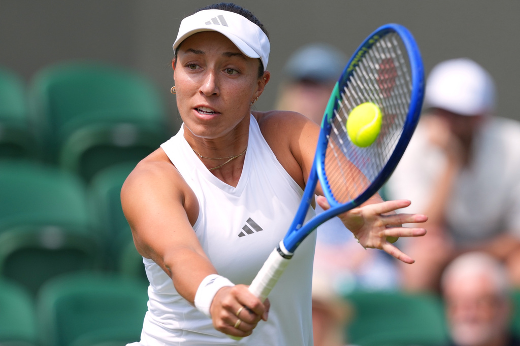 Jessica Pegula of the United States returns to Darja Vidmanova of Czech Republic during the women's singles match at the Wimbledon Tennis Championships in London, Monday, June 29, 2026.(AP Photo/Kirsty Wigglesworth)