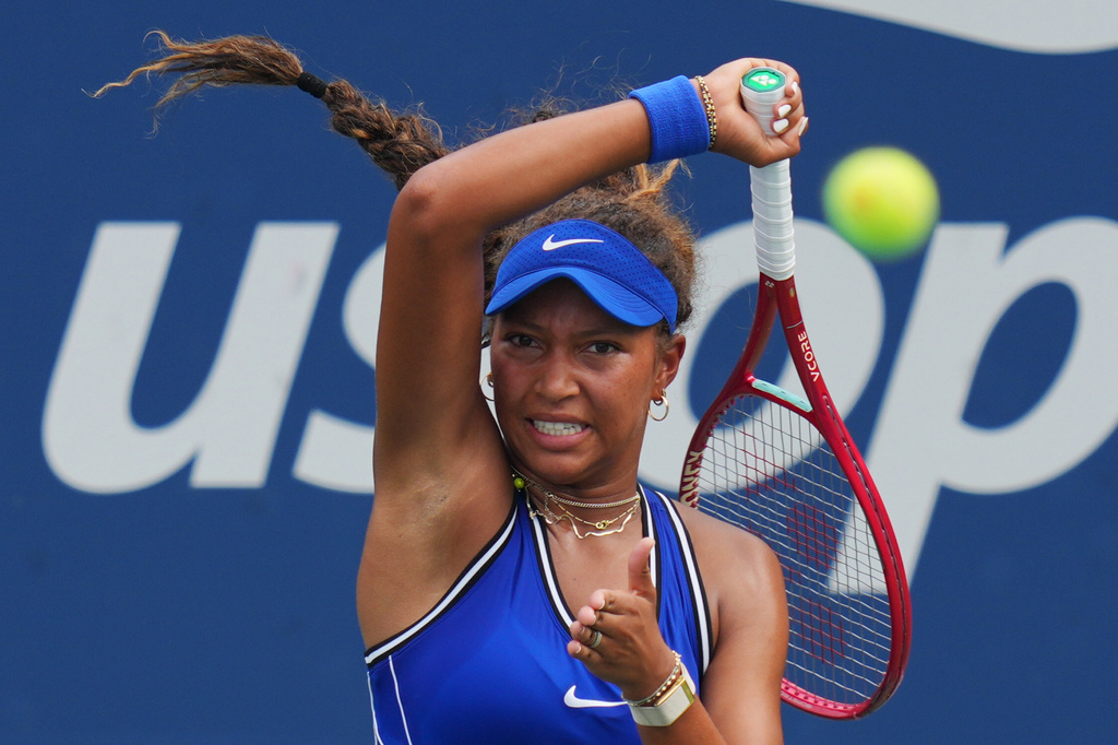 Thea Frodin, of the United States, returns the ball to Elena Rybakina, of Kazakhstan, during the first round of the U.S. Open tennis championships Tuesday, Sept. 1, 2026, in New York. (AP Photo/Kirsty Wigglesworth)