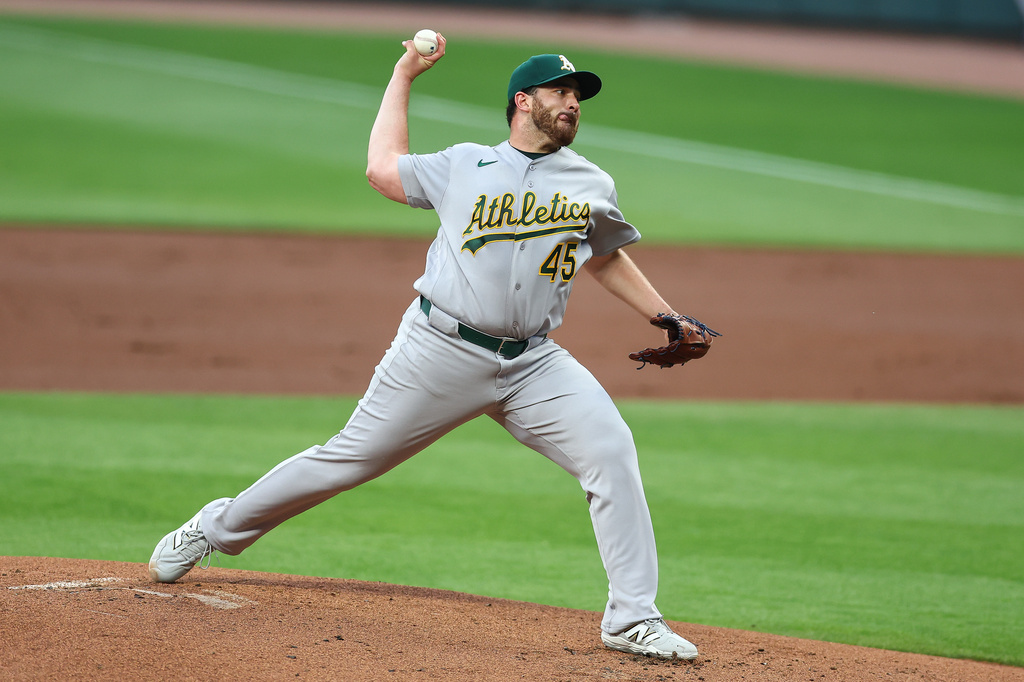 Athletics pitcher Aaron Civale delivers in the first inning of a baseball game against the Atlanta Braves, Tuesday, March 31, 2026, in Atlanta. (AP Photo/Colin Hubbard)