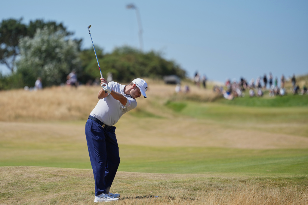 Rasmus Hojgaard of Denmark prepares to play a shot on the 10th fairway during a practice round for the British Open Golf championships at Royal Birkdale golf club, in Southport, England, Tuesday, July 14, 2026. (AP Photo/Jon Super)