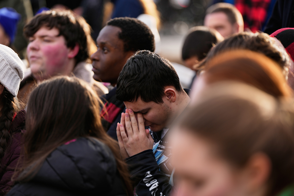An anti-abortion demonstrator bows his head during the annual March for Life in Washington, Friday, Jan. 23, 2026. (AP Photo/Julia Demaree Nikhinson)