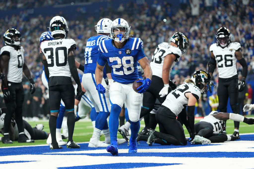Indianapolis Colts running back Jonathan Taylor (28) celebrates after scoring during the first half of an NFL football game against the Jacksonville Jaguars Sunday, Dec. 28, 2025, in Indianapolis. (AP Photo/AJ Mast)