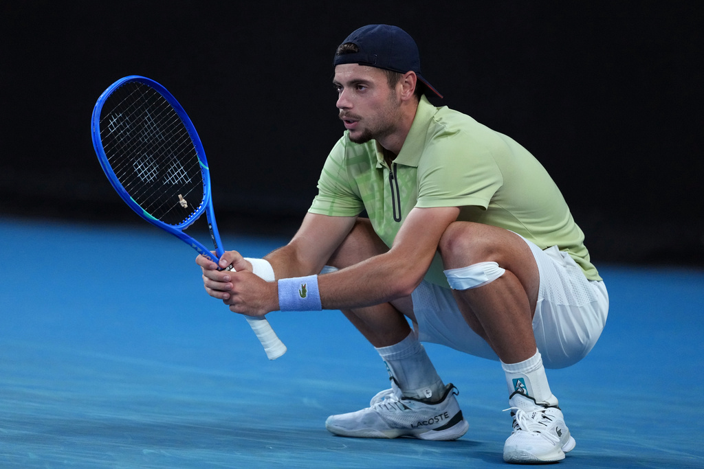 Arthur Gea of France reacts during his second round match against Stan Wawrinka of Switzerland at the Australian Open tennis championship in Melbourne, Australia, Thursday, Jan. 22, 2026. (AP Photo/Asanka Brendon Ratnayake)