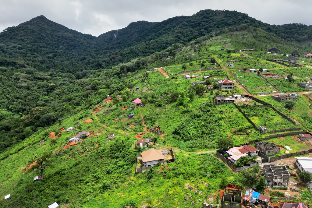 An aerial view of constructions near Tacugama Chimpanzee Sanctuary in Western Area Peninsula National Park, Sierra Leone, Friday, July 4, 2025. (AP Photo/Misper Apawu)