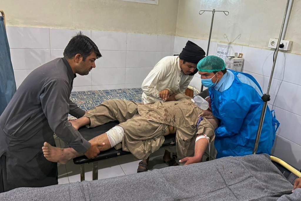 A man, who was injured in the clashes between Pakistan and Afghan forces in border area, receives medical treatment at a hospital in Chaman, a town on the Pakistan side of the Afghanistan border, Wednesday, Oct. 15, 2025. (AP Photo/H. Achakzai)