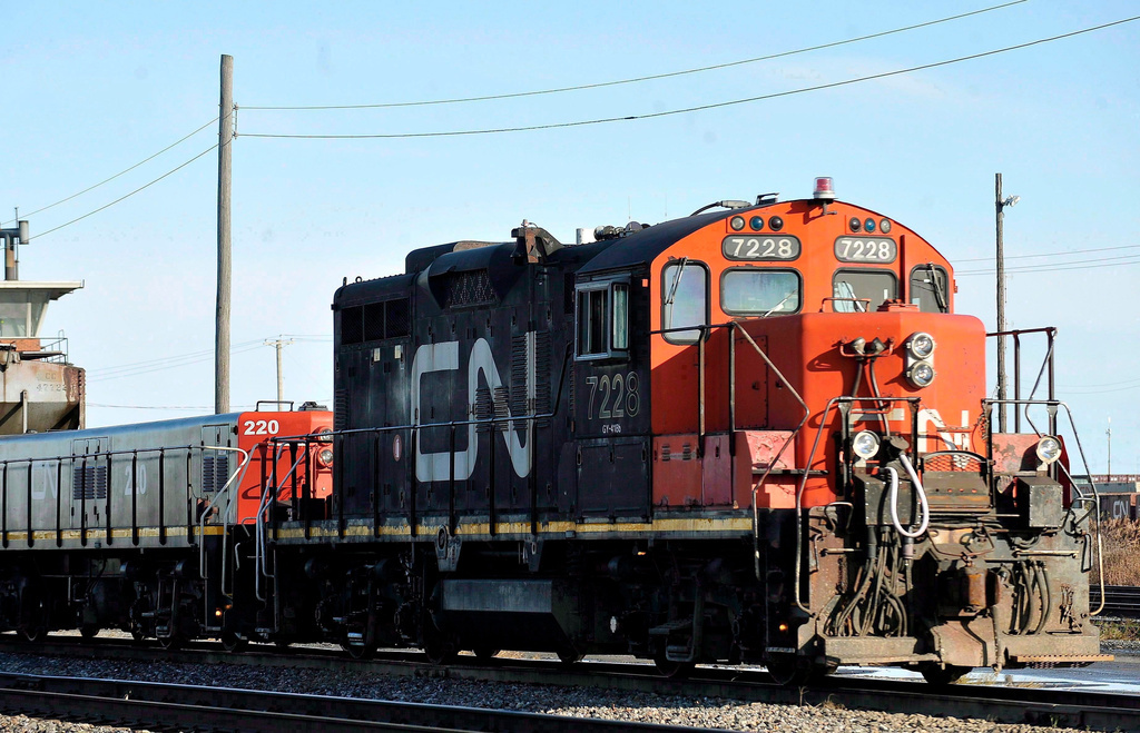 FILE - A Canadian National locomotive goes through the Canadian National Taschereau yard in Montreal, Saturday, Nov. 28, 2009. (Graham Hughes/The Canadian Press via AP, File)
