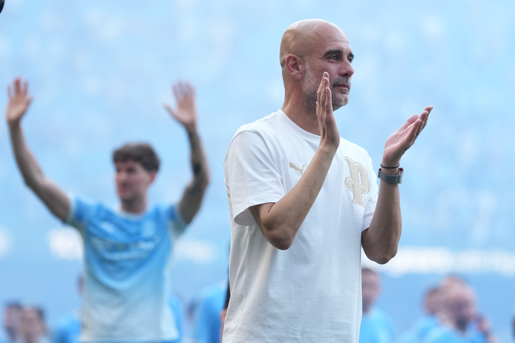 Manchester City's head coach Pep Guardiola applauds the fans after his last game with the club after a Premier League soccer match between Manchester City and Aston Villa in Manchester, England, Sunday, May 24, 2026. (AP Photo/Alastair Grant)
