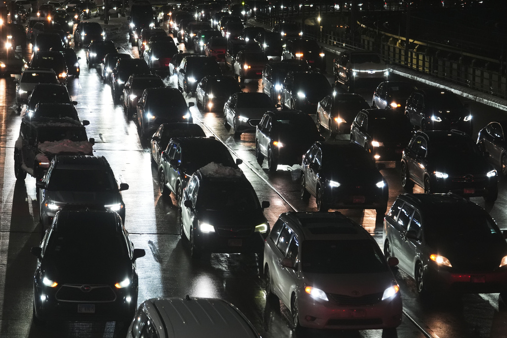 Heavy traffic is seen at the O'Hare International Airport in Chicago, Sunday, Nov. 30, 2025. (AP Photo/Nam Y. Huh)