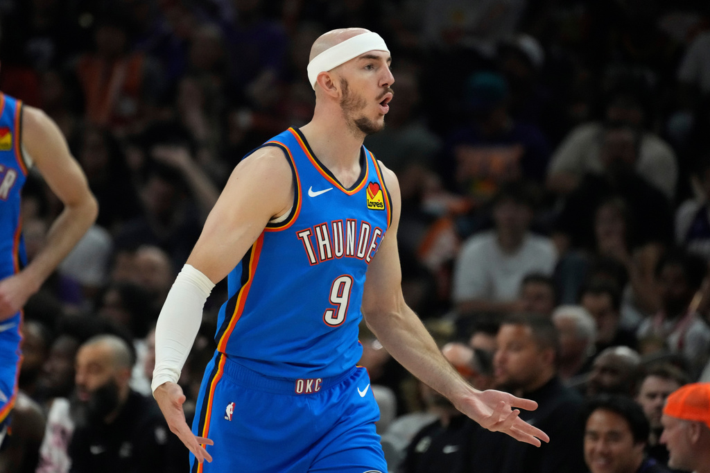 Oklahoma City Thunder guard Alex Caruso celebrates his 3-pointer against the Phoenix Suns during the first half of Game 4 in a first-round NBA playoffs basketball series, Monday, April 27, 2026, in Phoenix. (AP Photo/Ross D. Franklin)