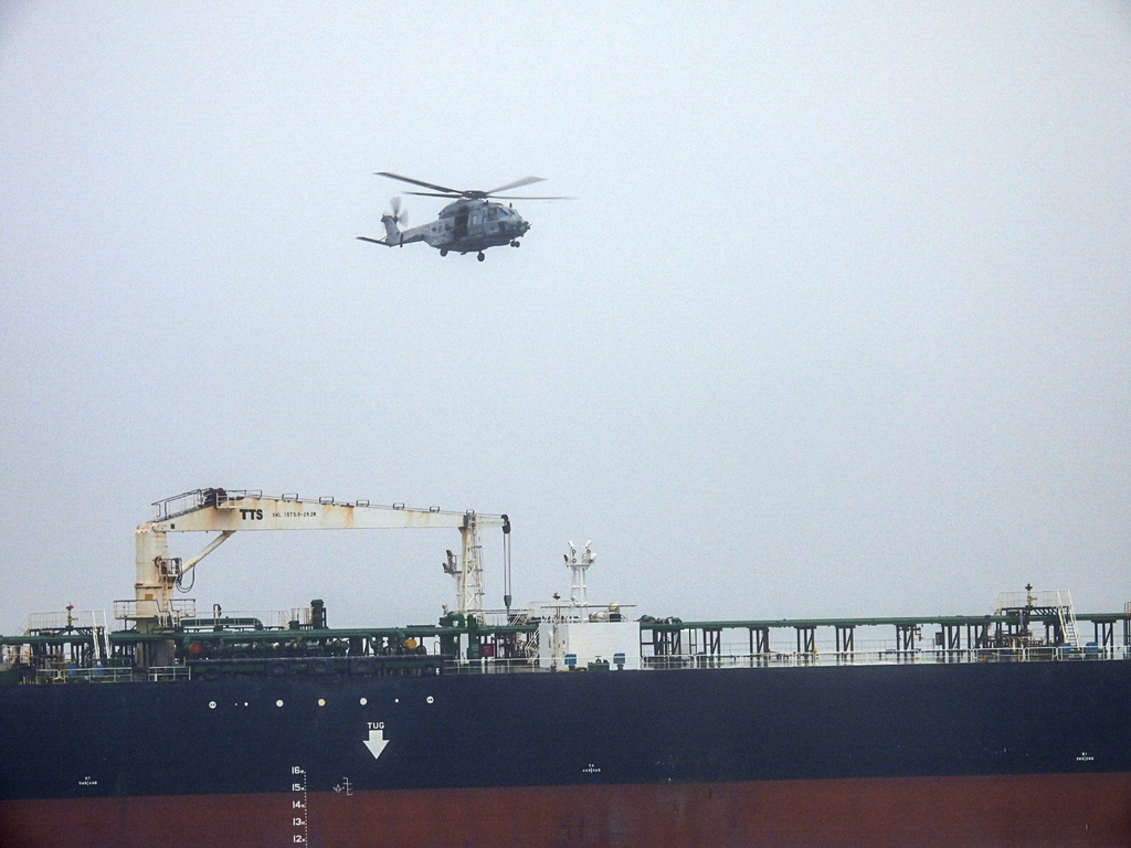 In this handout photo provided by the French Army, an NH90 helicopter intercepts an oil tanker that was traveling from Russia under international sanctions, on the Atlantic Sea, Sunday, May 31, 2026. (French Army via AP)