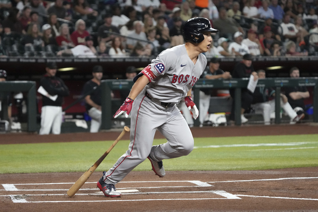 CORRECTS TO SATURDAY INSTEAD OF SUNDAY - Boston Red Sox' Masataka Yoshida starts to run after hitting against the Arizona Diamondbacks in the first inning of a baseball game, Saturday, Sept 6, 2025, in Phoenix. (AP Photo/Rick Scuteri)