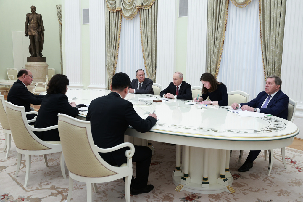 North Korean Foreign Minister Choe Son Hui, second left, attends talks with Russian President Vladimir Putin, third right, Russian Foreign Minister Sergey Lavrov, fourth right, and Yuri Ushakov, Russian Presidential foreign policy adviser, right, at the Kremlin in Moscow, Russia, Sunday, July 19, 2026. (Alexander Shcherbak, Sputnik, Kremlin Pool Photo via AP)