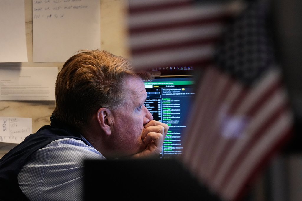 Trader John Bowers works on the floor of the New York Stock Exchange, Wednesday, June 3, 2026. (AP Photo/Richard Drew)
