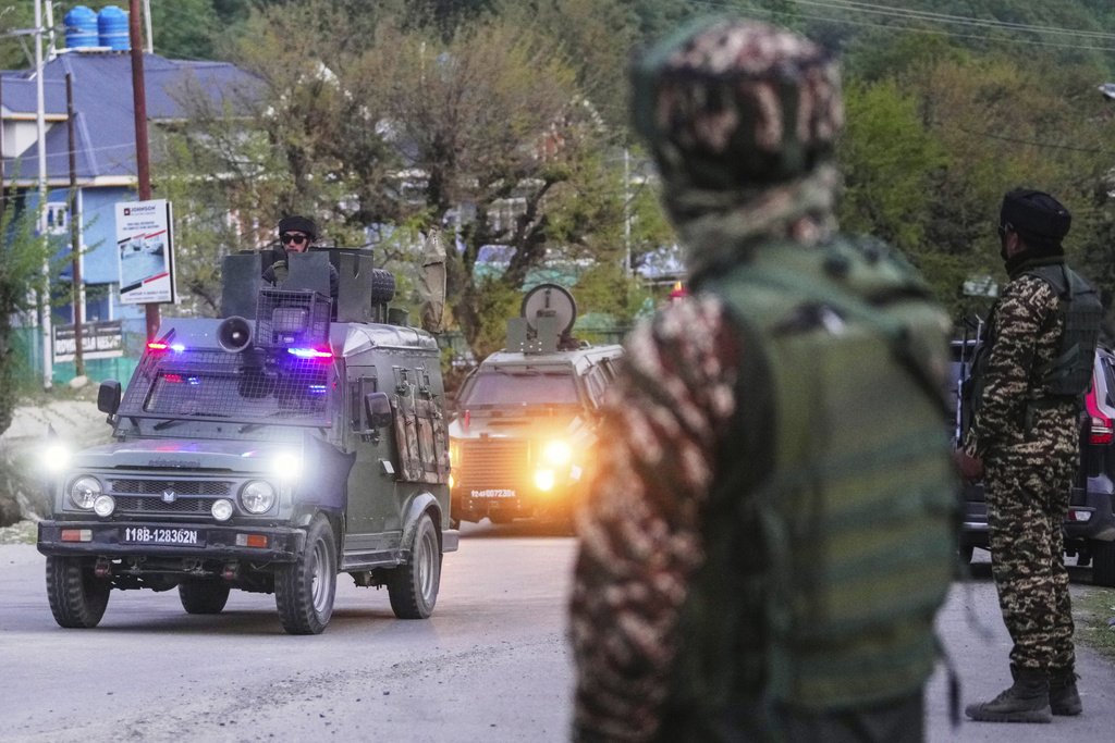 FILE - Indian security officers patrol in armored vehicles in Pahalgam, Indian controlled Kashmir, on April 22, 2025, after assailants indiscriminately opened fired at tourists. (AP Photo/Dar Yasin, File)