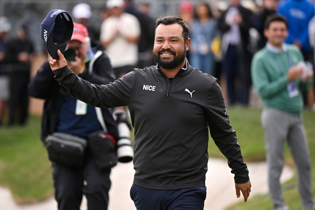 J.J. Spaun waves to fans after winning the Valero Texas Open golf tournament in San Antonio, Sunday, April 5, 2026. (AP Photo/Darren Abate)