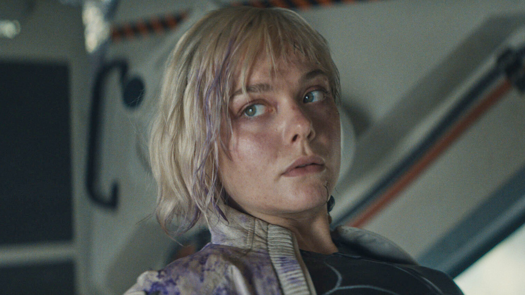 This image released by 20th Century Studios shows Elle Fanning in a scene from "Predator: Badlands." (20th Century Studios via AP)