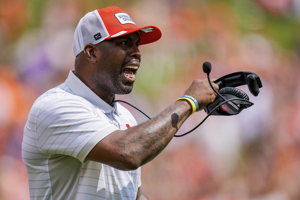 Syracuse head coach Fran Brown shouts in the first half of an NCAA college football game against Clemson, Saturday, Sept. 20, 2025, in Clemson, S.C. (AP Photo/Jacob Kupferman)