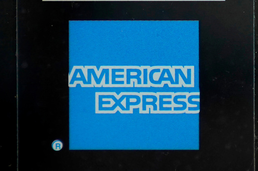FILE - An American Express logo is attached to a door in Boston's Seaport District, July 21, 2021. (AP Photo/Steven Senne, File) FILE - An American Express logo is attached to a door in Boston's Seaport District, July 21, 2021. (AP Photo/Steven Senne, File)