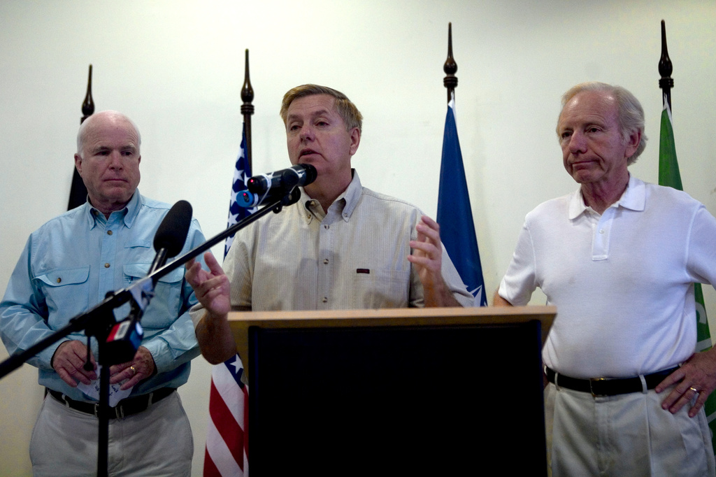 FILE - Senators John McCain, R-Ariz., from left, Lindsey Graham, R-S.C., and Joseph Lieberman, I-Conn., attend a press conference, July 5, 2010 in Kabul, Afghanistan. (AP Photo/Dusan Vranic, File)