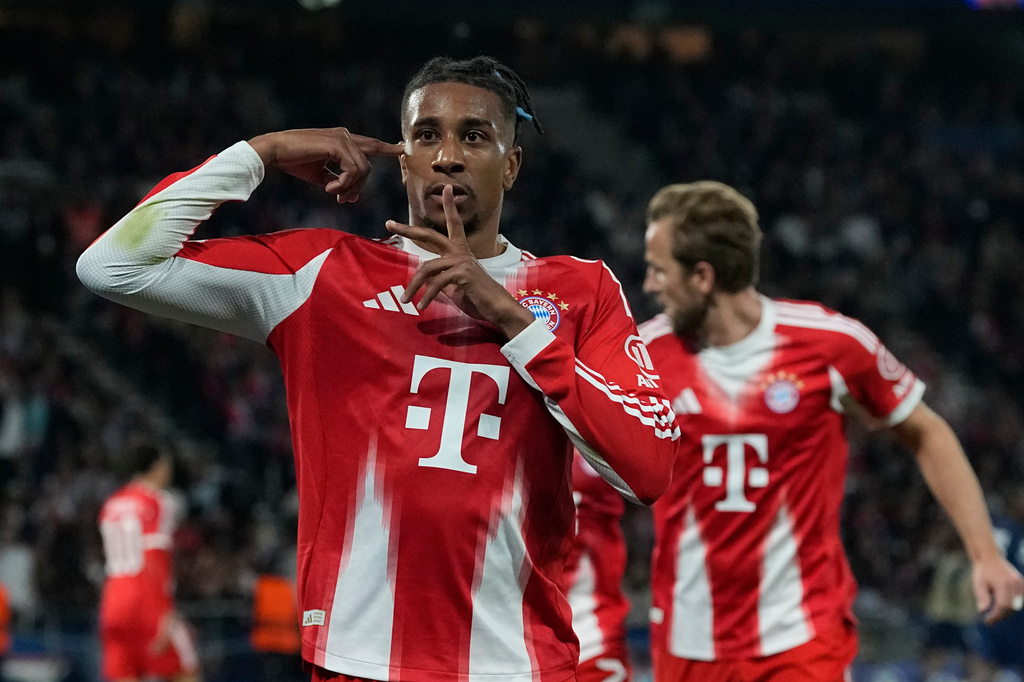 Bayern's Michael Olise celebrates after scoring his side's second goal during the Champions League semifinal first leg soccer match between Paris Saint-Germain and Bayern Munich in Paris, Tuesday, April 28, 2026. (AP Photo/Christophe Ena)