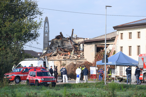 Rescuers inspect a collapsed two-story farmhouse in Castel d'Azzano, some 10 kilometers south-west of Verona, where three carabinieri officers have been killed, and 13 others injured, in an explosion during an eviction, early Tuesday, Oct. 14, 2025. (Claudio Furlan/LaPresse via AP) Rescuers inspect a collapsed two-story farmhouse in Castel d'Azzano, some 10 kilometers south-west of Verona, where three carabinieri officers have been killed, and 13 others injured, in an explosion during an eviction, early Tuesday, Oct. 14, 2025. (Claudio Furlan/LaPresse via AP)