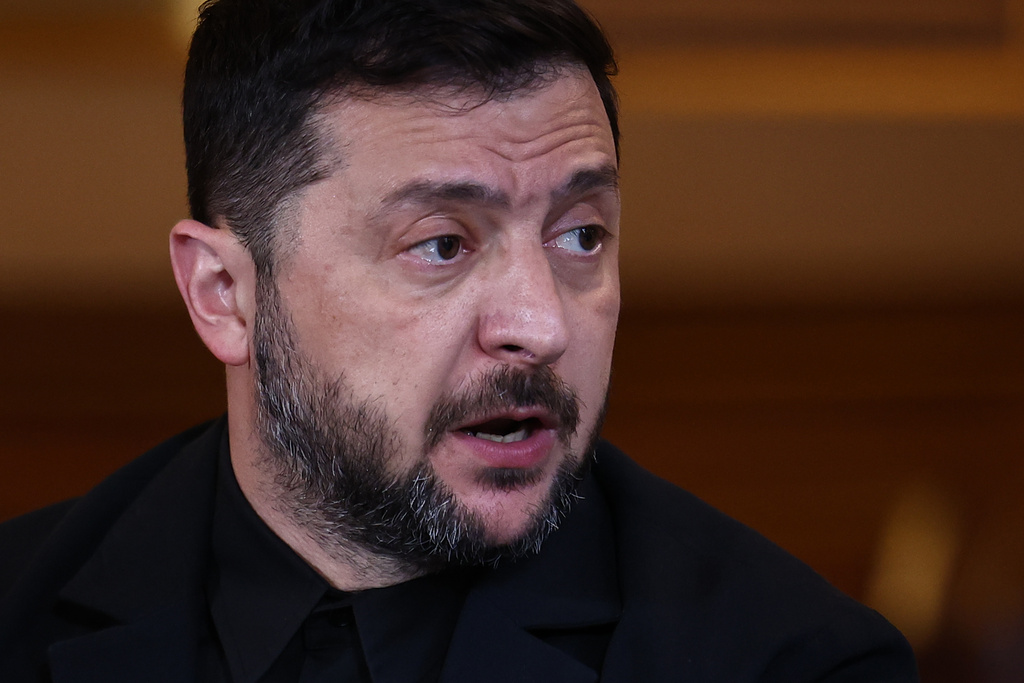 Ukraine's President Volodymyr Zelenskyy, speaks during a 'Coalition of the Willing' meeting of international partners on Ukraine at the Foreign, Commonwealth, and Development Office (FCDO) in central London, Friday Oct. 24, 2025. (Henry Nicholls/Pool Photo via AP)