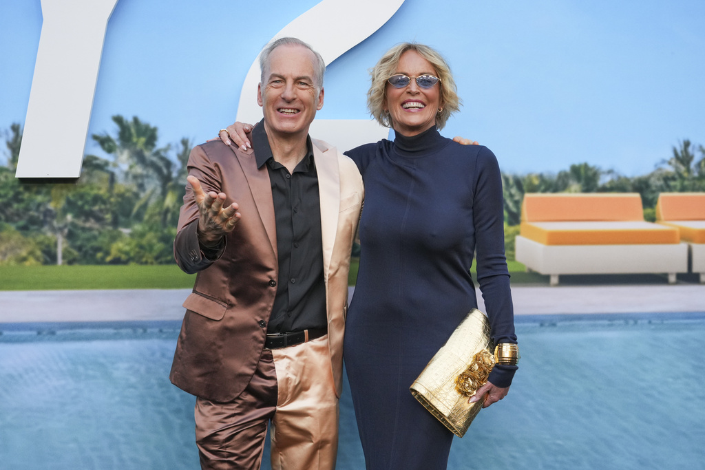 Bob Odenkirk, left, and Sharon Stone arrive at the premiere of "Nobody 2" on Monday, Aug. 11, 2025, at TCL Chinese Theatre in Los Angeles. (Photo by Jordan Strauss/Invision/AP)