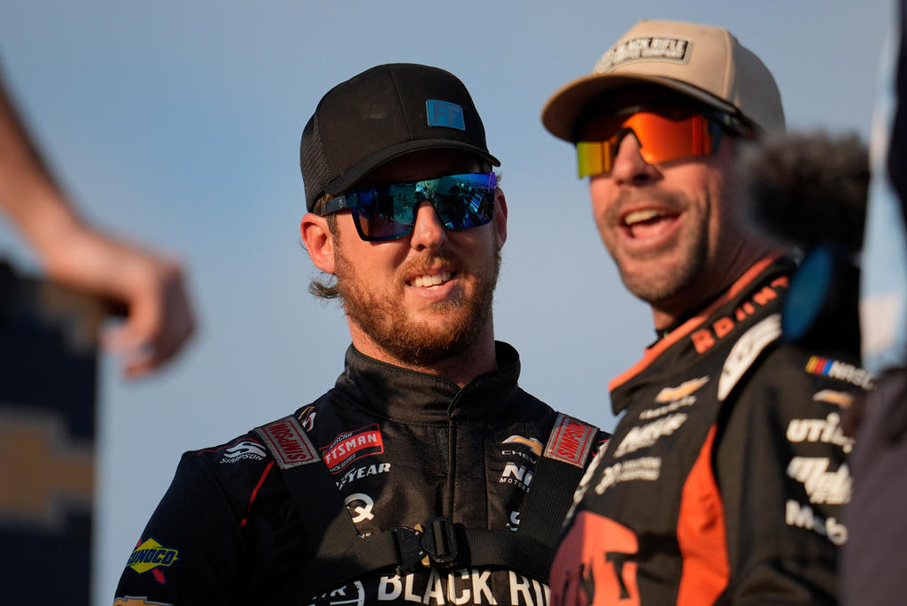 NASCAR Truck driver Garrett Mitchell, better known as "Cleetus McFarland, prepares for a practice at Daytona International Speedway, Thursday, Feb. 12, 2026, in Daytona Beach, Fla. (AP Photo/Mike Stewart)