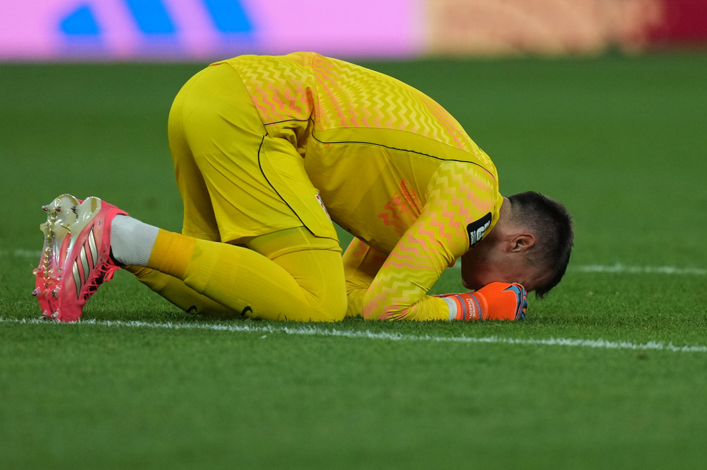 Croatia goalkeeper Dominik Livakovic (1) celebrates at the end of the World Cup Group L soccer match between Panama and Croatia in Toronto, Tuesday, June 23, 2026. (AP Photo/Stephanie Scarbrough)
