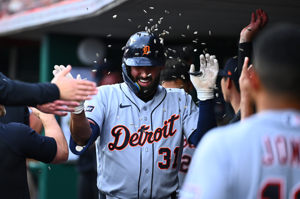 Detroit Tigers' Riley Greene celebrates after his solo home run with teammates during the second inning of a baseball game against the Cincinnati Reds in Cincinnati, Friday, April 24, 2026. (AP Photo/Ben Jackson)