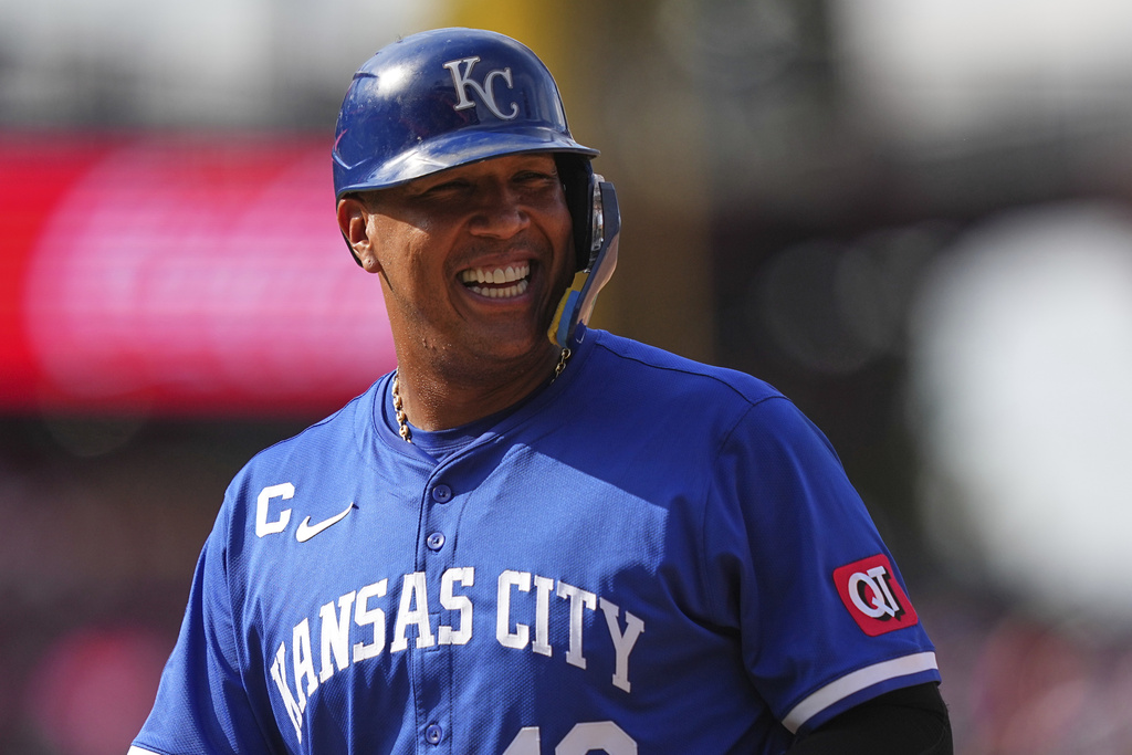 Kansas City Royals' Salvador Perez smiles after hitting an RBI single off Philadelphia Phillies pitcher Tim Mayza during the seventh inning of a baseball game, Sunday, Sept. 14, 2025, in Philadelphia. (AP Photo/Matt Rourke)