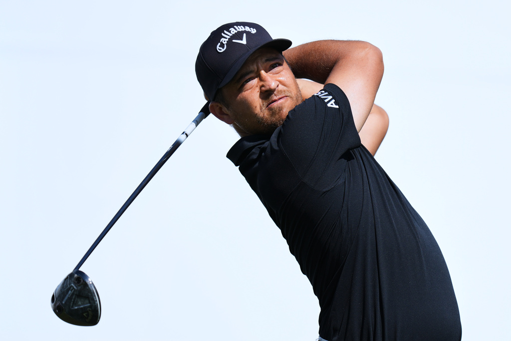 Xander Schauﬀele of the U.S. tees off on the 1st hole during the second round of the Baycurrent Classic golf tournament at the Yokohama Country Club in Yokohama, near Tokyo, Friday, Oct. 10, 2025. (AP Photo/Hiro Komae)