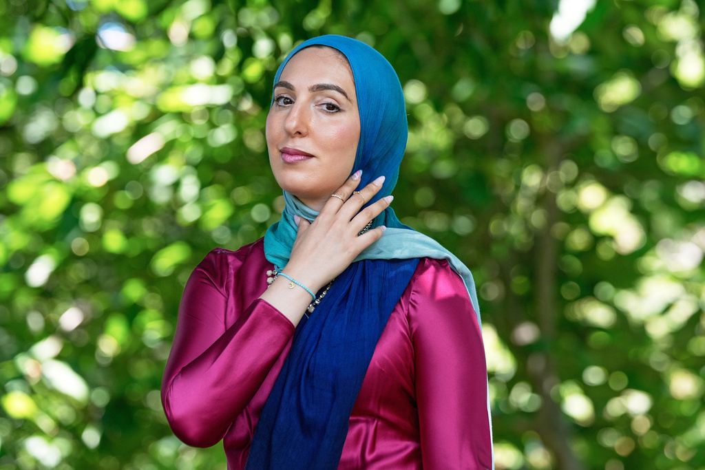 FILE - Yasmin Elhady, a matchmaker featured on the series, "Muslim Matchmaker," on Hulu, poses in Falls Church, Va, on Aug. 12, 2025. (AP Photo/Mariam Zuhaib, File)