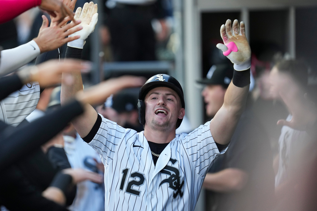 Chicago White Sox's Colson Montgomery (12) celebrates after hitting a two-run home run during the first inning of a baseball game against the Seattle Mariners, Saturday, May 9, 2026, in Chicago. (AP Photo/Erin Hooley)