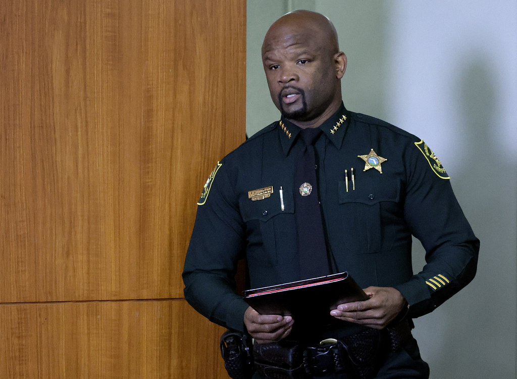 Broward Sheriff Gregory Tony and members of the Broward Sheriff's Office Internal Affairs Unit hold a news conference at the BSO Public Safety Building in Fort Lauderdale, Fla., on Friday, Sept. 12, 2025, about police misconduct in the Tamarac triple homicide case. (Mike Stocker/South Florida Sun-Sentinel via AP)
