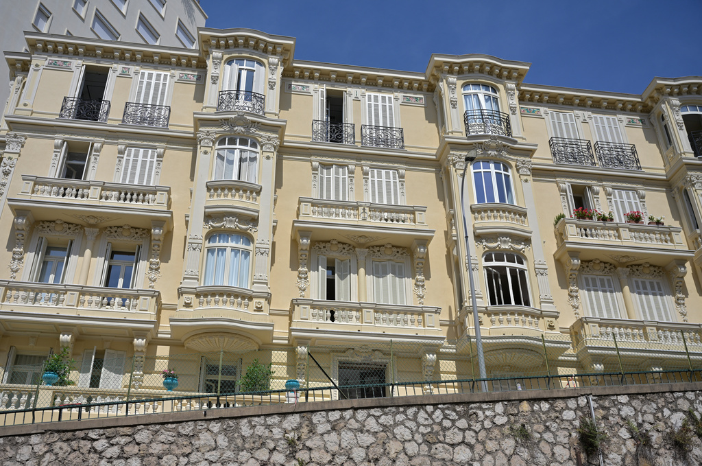 A view of the residential building where an explosive device seriously injured three people in Monaco, Tuesday, June 30, 2026. (AP Photo/Philippe Magoni)