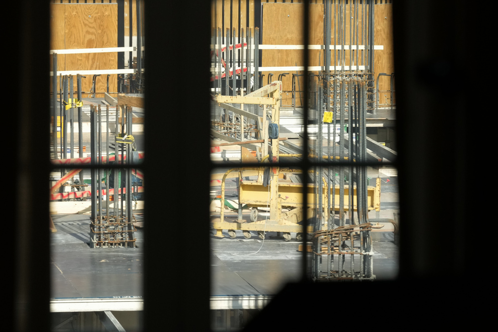 Construction of the new White House Ballroom is seen from a window in the East Room Monday, May 4, 2026, at the White House in Washington. (AP Photo/Mark Schiefelbein)
