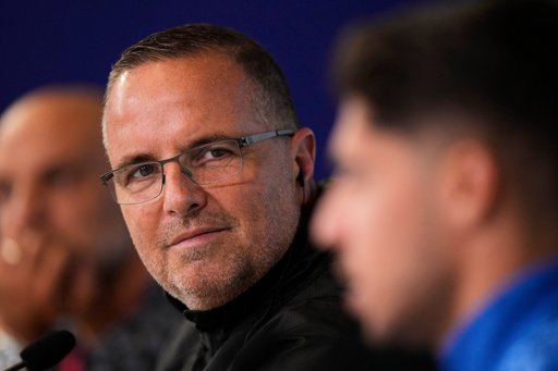 Israel coach Ran Ben Simon attends a news conference flanked by Israel's Manor Solomon ahead of Tuesday's World Cup 2026, Group I qualifying soccer match between Italy and Israel at the Friuli Stadium in Udine, Italy, Monday, Oct.13, 2025. (AP Photo/Luca Bruno) Israel coach Ran Ben Simon attends a news conference flanked by Israel's Manor Solomon ahead of Tuesday's World Cup 2026, Group I qualifying soccer match between Italy and Israel at the Friuli Stadium in Udine, Italy, Monday, Oct.13, 2025. (AP Photo/Luca Bruno)