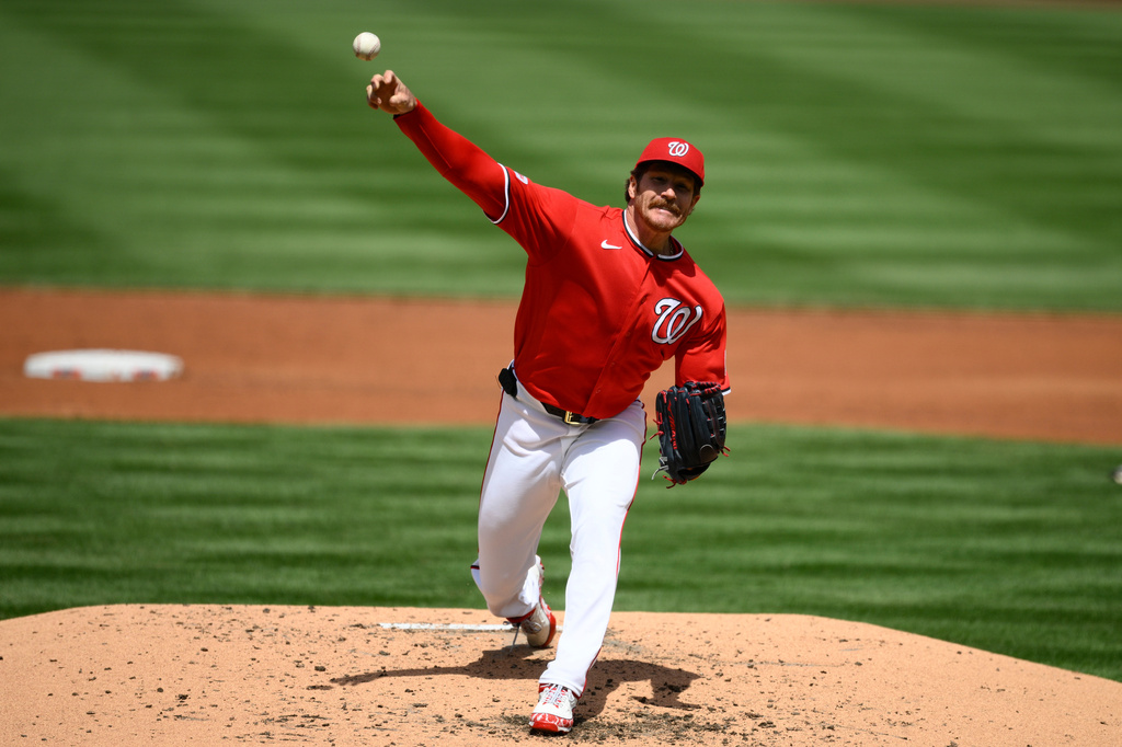 Washington Nationals relief pitcher Miles Mikolas throws during the second inning of a baseball game against the San Francisco Giants, Sunday, April 19, 2026, in Washington. (AP Photo/Nick Wass)