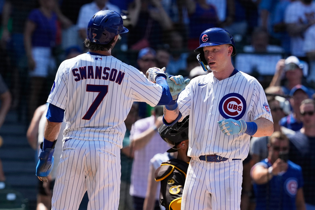 Chicago Cubs' Pete Crow-Armstrong, right, celebrates with Dansby Swanson after hitting a three-run home run during the fifth inning of a baseball game against the San Diego Padres in Chicago, Wednesday, July 1, 2026. (AP Photo/Nam Y. Huh)