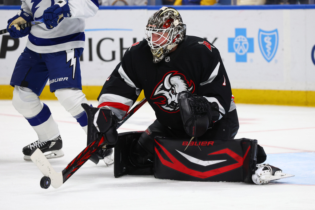 Buffalo Sabres goaltender Ukko-Pekka Luukkonen (1) makes a stick save during the second period of an NHL hockey game against the Tampa Bay Lightning Monday, April 6, 2026, in Buffalo, N.Y. (AP Photo/Jeffrey T. Barnes)