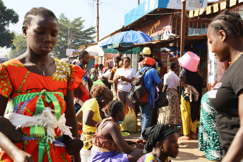 Women sells goods at a market in Bissau, Guinea-Bissau, Friday, Nov. 28, 2025. (AP Photo/Darcicio Barbosa)