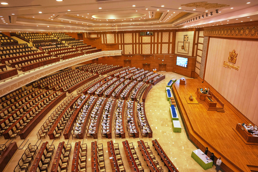 Myanmar lawmakers attend a session at Lower House of Parliament in Naypyitaw, Myanmar, Monday, March 30, 2026. (AP Photo/Aung Shine Oo)