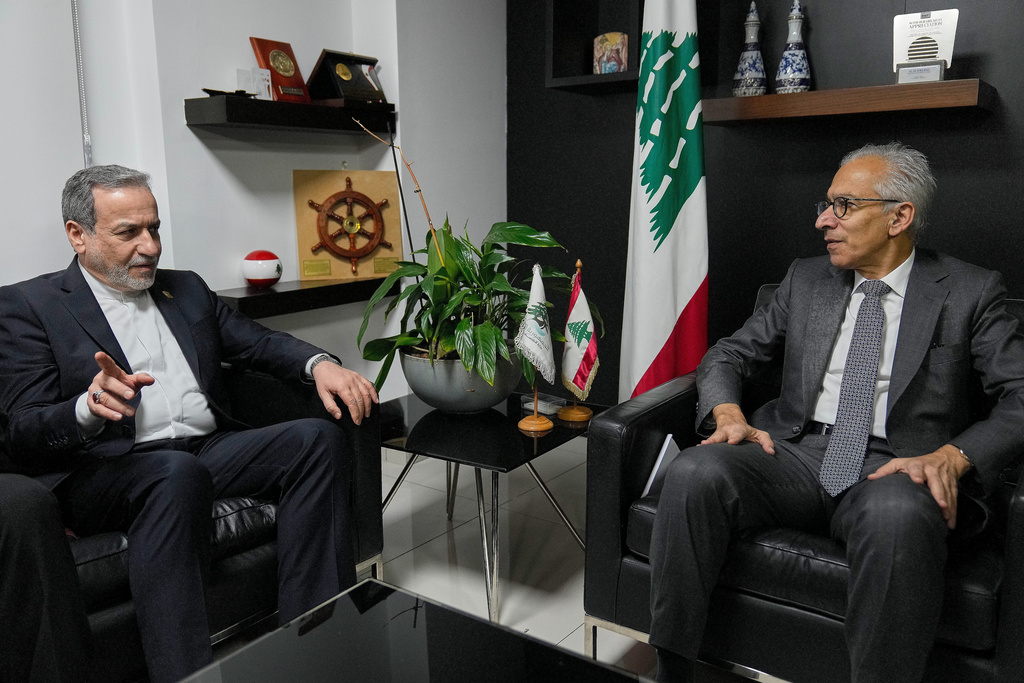 Iranian Foreign Minister Abbas Araghchi, left, meets with Amer Bisat, the Lebanese minister of Economy and Trade, in Beirut, Lebanon, Tuesday, Jan. 8, 2026. (AP Photo/Hussein Malla)