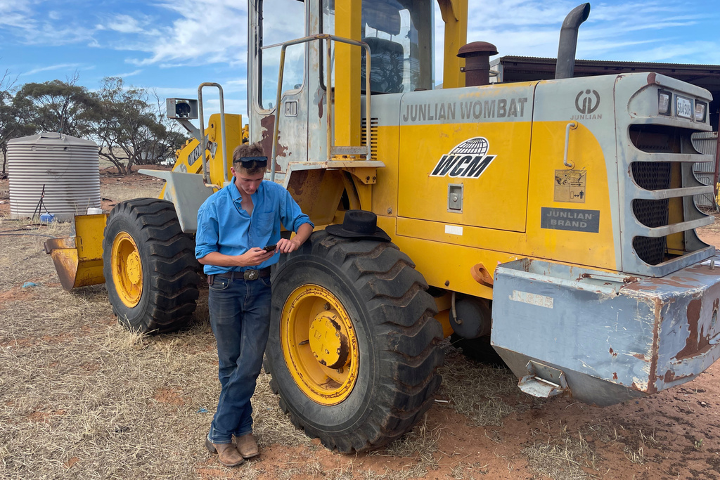 In this photo provided by Jason Allen, his son, 15-year-old Riley Allen, poses for a photo on his family's sheep ranch near Wudinna, Australia, Tuesday, Dec. 9, 2025. (Jason Allen via AP)