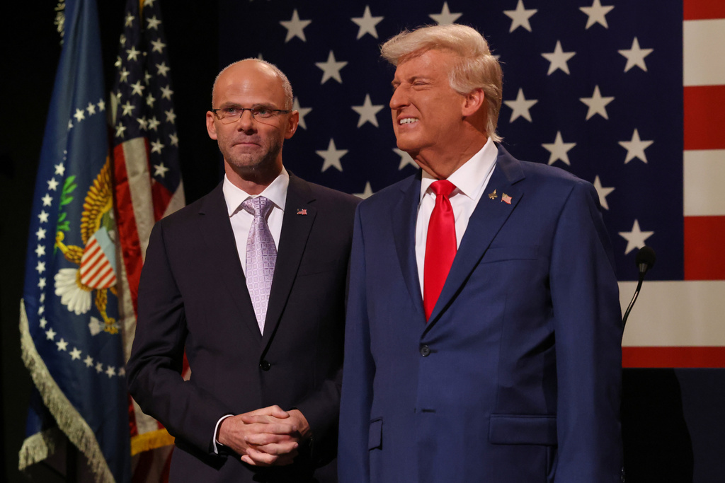 This image released by NBC shows Mikey Day as Brendan Carr, left, and James Austin Johnson as President Donald Trump during the cold open on "Saturday Night Live" in New York on Saturday, Oct. 4, 2025. (Will Heath/NBC via AP)