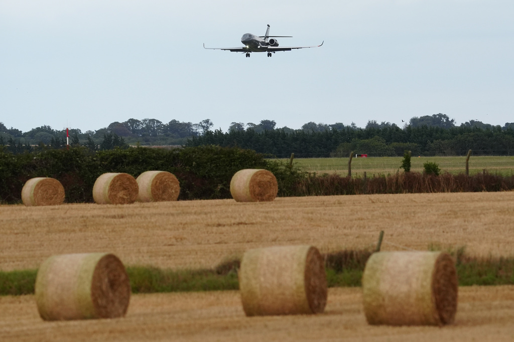 An Irish government plane believed to be carrying Daniel Kinahan landing at Casement Aerodrome in Baldonnell, Ireland, Sunday, Aug. 9, 2026, following him being extradited from Dubai, to face a charge of directing an organized crime group. (Brian Lawless/PA via AP)