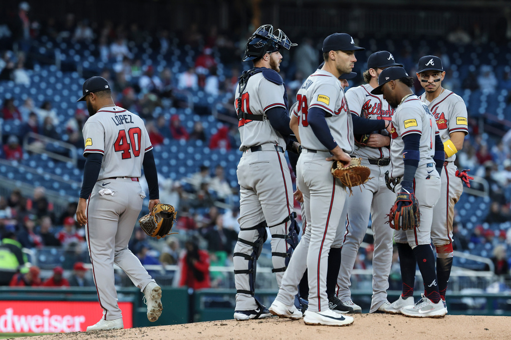 Atlanta Braves pitcher Reynaldo López (40) walks off the field after being taken out of the game by manager Walt Weiss during the second inning of a baseball game against the Washington Nationals, Tuesday, April 21, 2026, in Washington. (AP Photo/Terrance Williams)